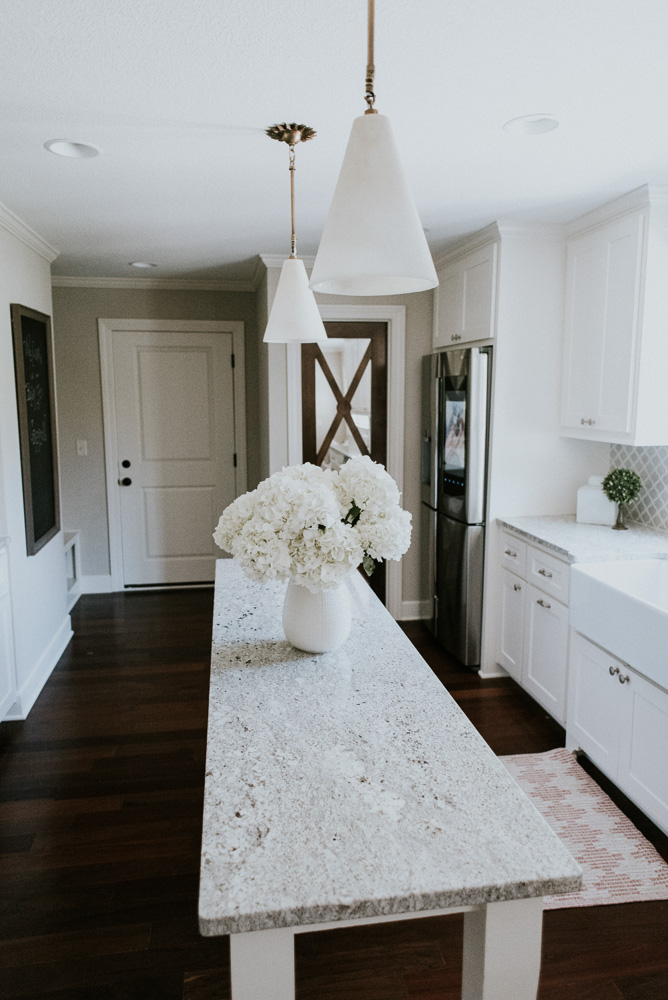 white-ice-granite-farm-sink