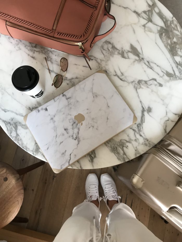 Travel Essentials marble macbook cover